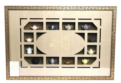 Lot 320 12 chinese jade hardstone miniature teapots, framed