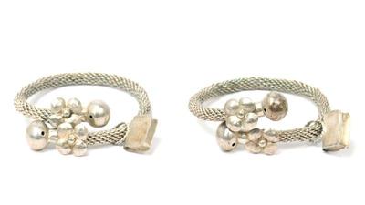 Lot 143 pair of silver woven african bracelets