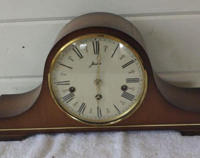 Camel hump mantle clock