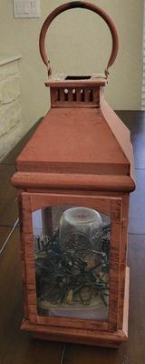 Glass and metal lantern
