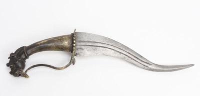 Lot 24 south indian brass yali hilted recurve dagger 18th 19th c.