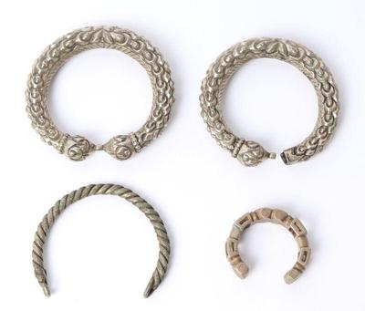 Lot 57 four assorted metal bracelets 20th c.