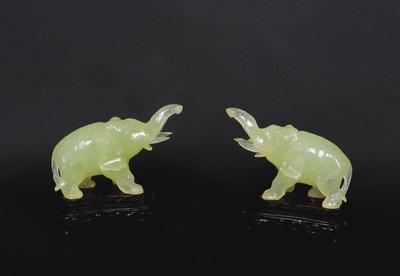 Lot 152 fine pair of celadon glass elephants