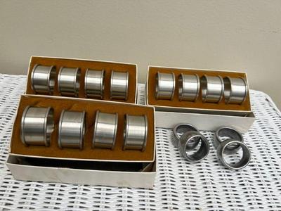 Four Sets Of International Pewter Napkin Rings