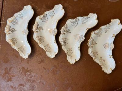 Set Of Four Hand-Gilded Porcelain Crescent Shaped Dishes