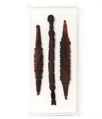 Lot 591 trio of mounted tribal loom tools