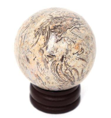 Lot 420 wonderful polished dinosaur bone sphere