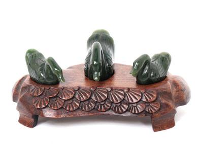 Lot 206 three lovely jade style swans on custom stand