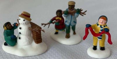 Dept 56 playing in the snow” figures