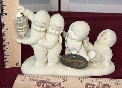 Dept 56 snowbabies “even a small light shines in the darkness”