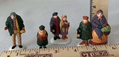 Dept 56 carolers on the doorstep” figures