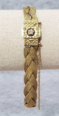 14k gold mesh bracelet with a diamond