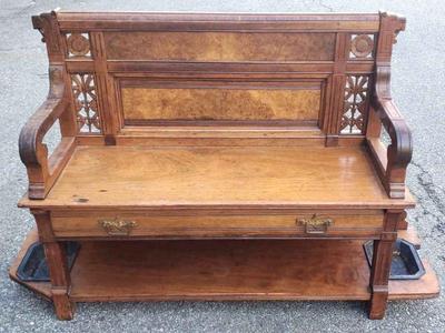 Beautiful antique bench with umbrella stands