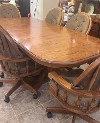 Oak table with leaves and 6 captain s armchairs
