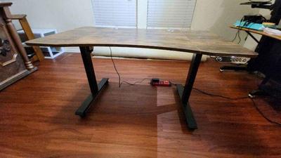 Adjustable height desk