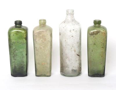 Lot 312 embossed african gin bottle collection