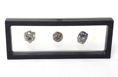 Lot 161 trio of chinese glazed beads