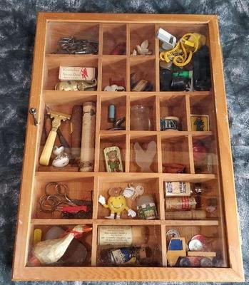 Shadow box with miniatures and collectibles novelties