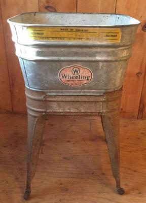Wheeling wash tub and stand