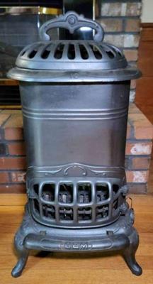 Gem cast iron parlor sized wood or coal stove