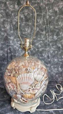 Oyster shaped sea shell filled table lamp