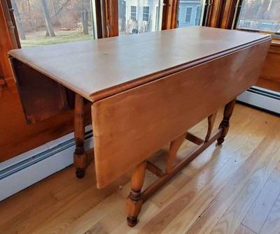 Solid wood drop leaf dining table