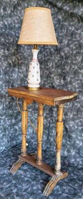 Antique bedside table with milk glass lamp