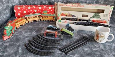 Christmas train sets and a christmas mug