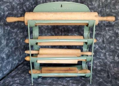 Vintage wooden rolling pins and enamelware rack