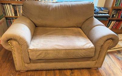 Light brown love seat