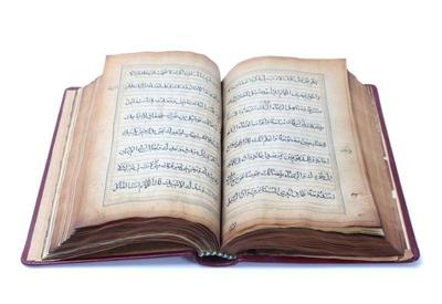 Lot 239 large antique arabic) koran, rebound