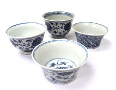 Lot 311 collection of four chinese blue white cups