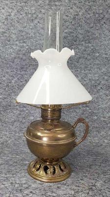 Vintage brass hurricane lamp with milk glass shade