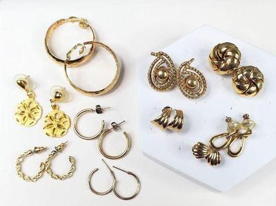 10 pair of gold toned earrings