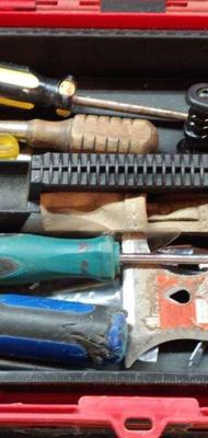 Box of tools and carpenter belt