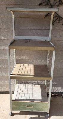 Metal outdoor cartshelving unit on wheels