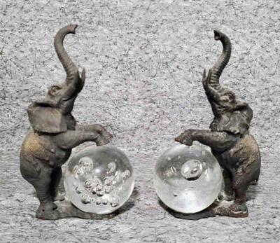 Pair of elephants on glass ball figure paperweights