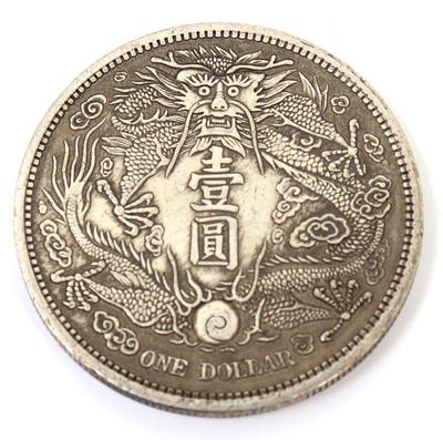 Lot 232 chinese one dollar style coin