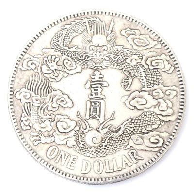 Sale Photo Thumbnail #235: Lot 239 chinese one dollar style coin