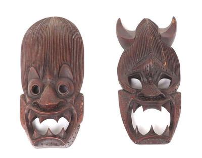 Lot 219 two wood carved tibetan transformation masks