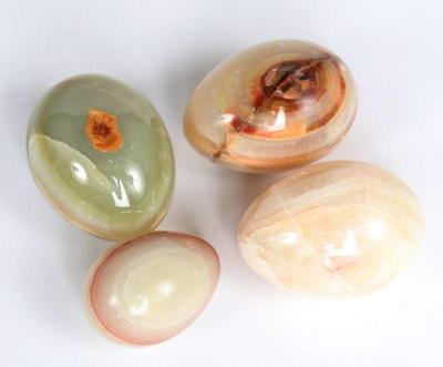 Lot 490 group of polished green onyx stone eggs
