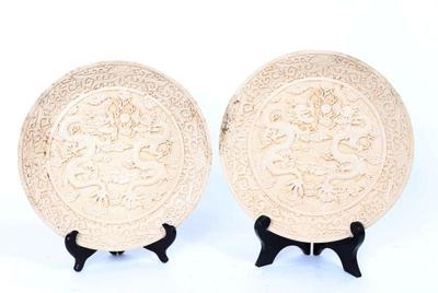 Lot 407 pair of cast white dragon plates