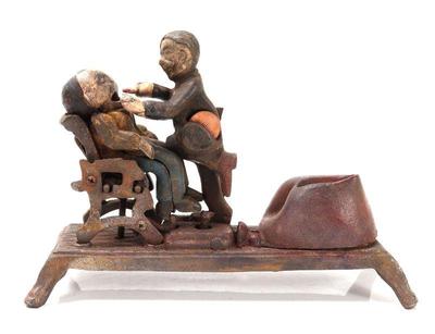 Lot 496 cast iron mechanical bank dentist
