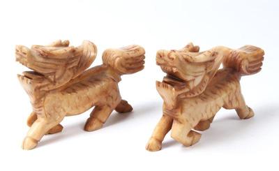 Lot 309 pair of chinese hardstone qilin dragon carvings