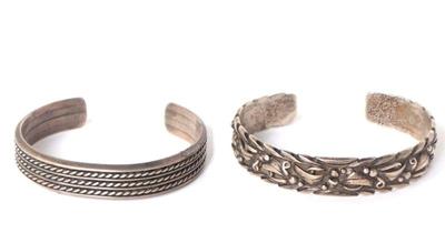 Sale Photo Thumbnail #118: Lot 122 two native american silver bracelets