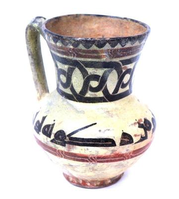 Sale Photo Thumbnail #206: Lot 210 finely made kufic inscribed jug 9th 10th century