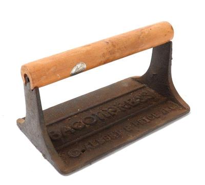 Lot 152 cast iron bacon press