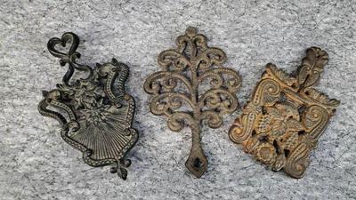 Vintage cast iron trivets