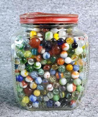 Big jar of 100s of marbles