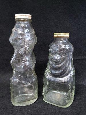 Vintage clown shaped glass bottle banks